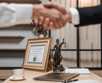 Client shaking hands with a lawyer